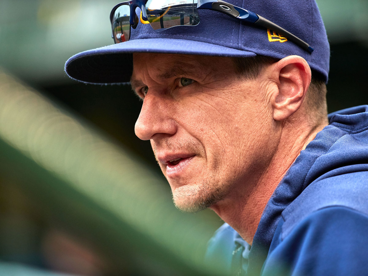 Close up of Craig Counsell in the dugout
